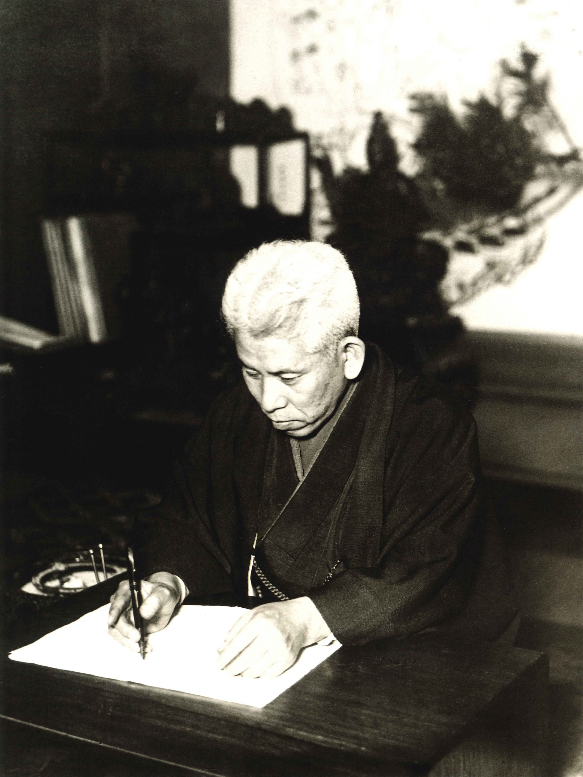 Okada, corrects his manuscript at Ojindo in Tokyo Hanzomon