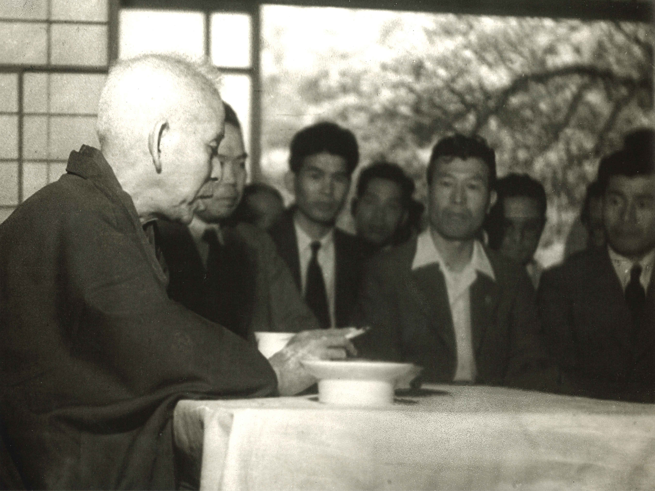 Okada, teaches intimately at his meeting with the members (around 1948)
